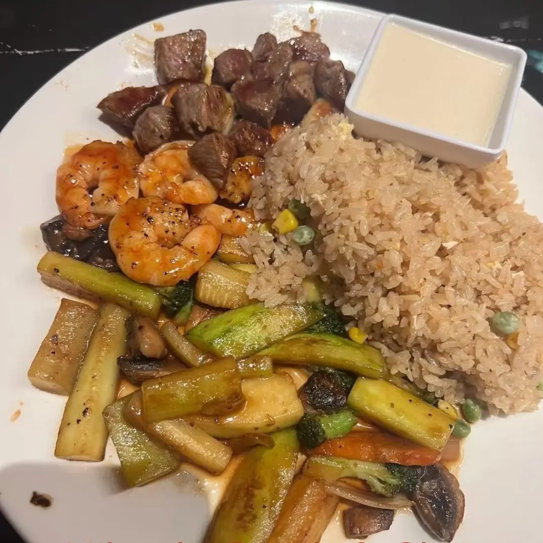Rice, veggies, steak and shrimp with sauce at AKAMI Sushi & Grill,a Japanese Restaurant in Dawsonville